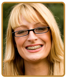 woman smiling and wearing braces